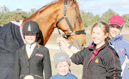 Family sport: (From left) Sarah, Harry, Georgia and Libby Doyle with Georgia’s horse. Family sport: (From left) Sarah, Harry, Georgia and Libby Doyle with Georgia’s horse.